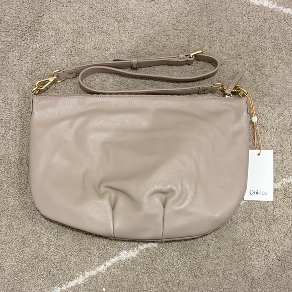 Quince Italian Leather Convertible Crescent
Shoulder Bag in Taupe